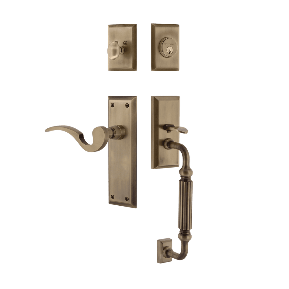 Nostalgic 767592: Entry Lockset w/New York Backplate, F-Grip Exterior Handle and Manor Interior Lever - Antique Brass