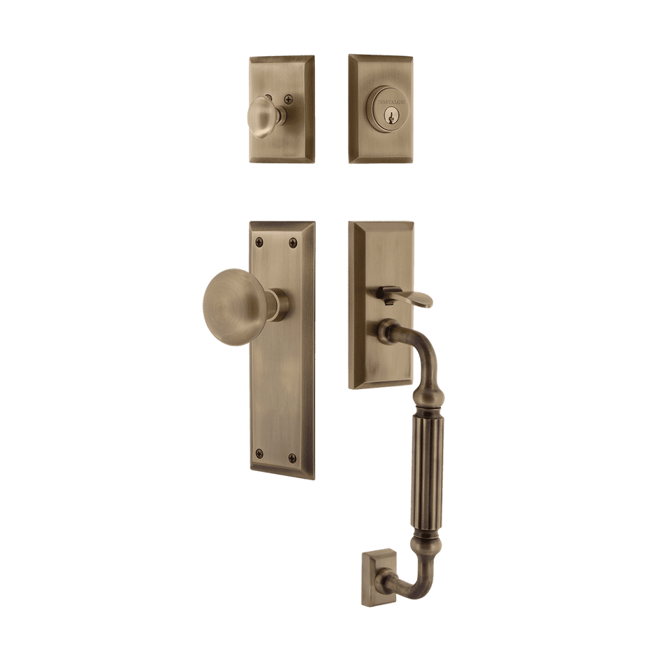 Nostalgic 719443: Entry Lockset w/New York Backplate, F-Grip Exterior Handle and New York Knob - Antique Brass