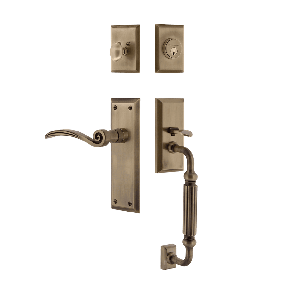 Nostalgic 770866: Entry Lockset w/New York Backplate, F-Grip Exterior Handle and Swan Interior Lever - Antique Brass
