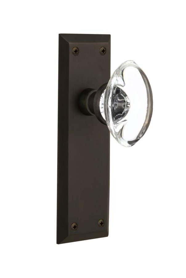 Nostalgic 711632: New York Backplate w/Oval Clear Glass Crystal Knob Privacy Door Set - Oil-Rubbed Bronze