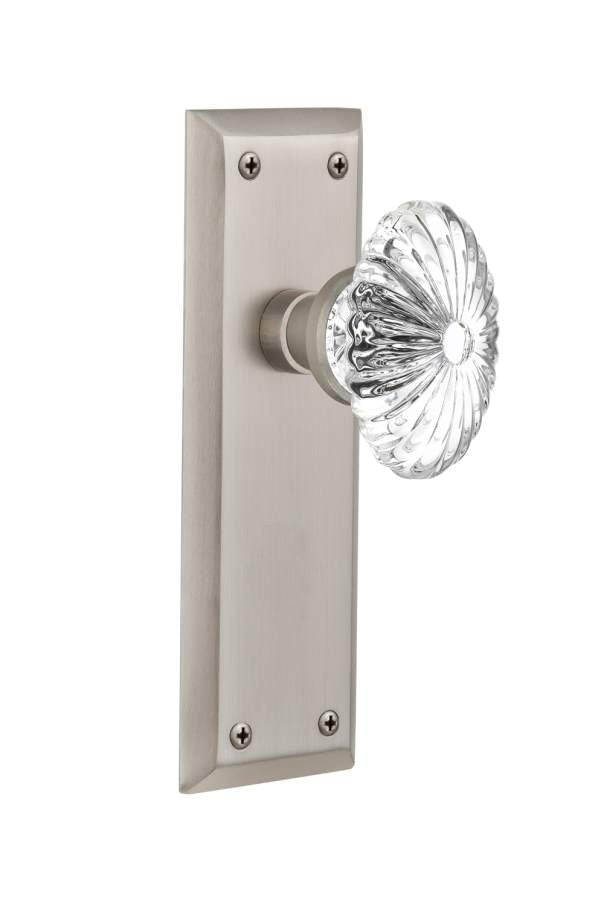 Nostalgic 712074: New York Backplate w/Oval Fluted Clear Glass Crystal Knob Privacy Door Set - Satin Nickel