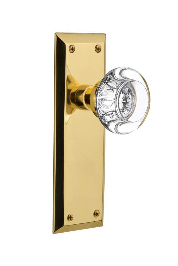 Nostalgic 717068: New York Backplate w/Round Clear Glass Crystal Knob Privacy Door Set - Unlacquered Brass