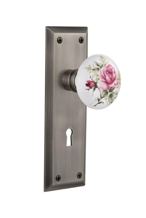 Nostalgic 711244: New York Backplate w/White Rose Porcelain Knob Privacy Door Set - Antique Pewter