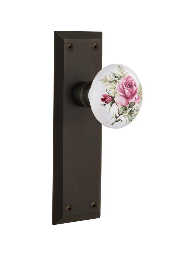 Nostalgic 711000: New York Backplate w/White Rose Porcelain Knob Single Dummy Door Set - Oil-Rubbed Bronze