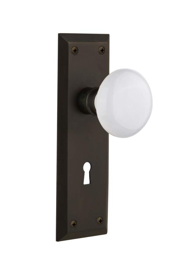 Nostalgic 704639: New York Backplate w/White Porcelain Knob Passage Door Set - Oil-Rubbed Bronze