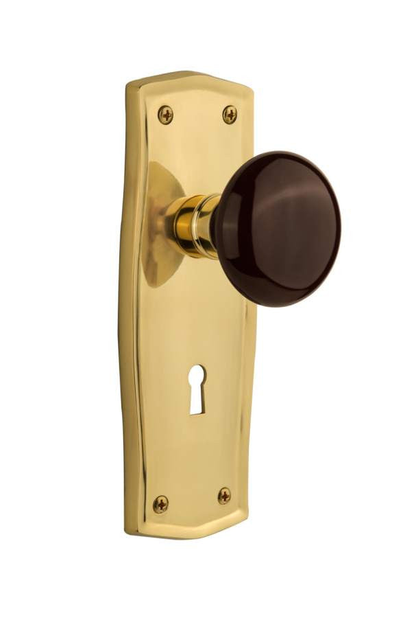 Nostalgic 710622: Prairie Backplate w/Brown Porcelain Knob Single Dummy Door Set - Polished Brass