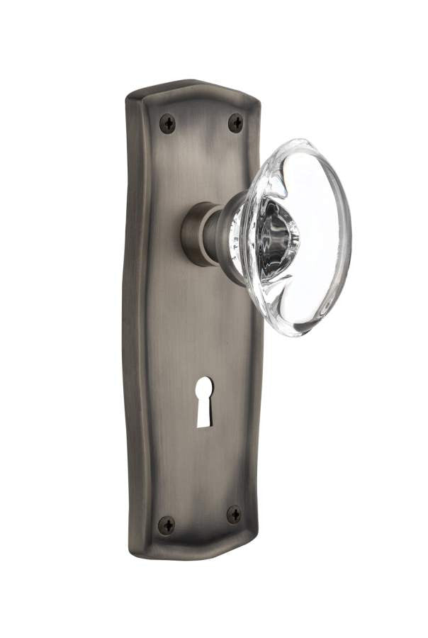 Nostalgic 711499: Prairie Backplate w/Oval Clear Glass Crystal Knob Single Dummy Door Set - Antique Pewter