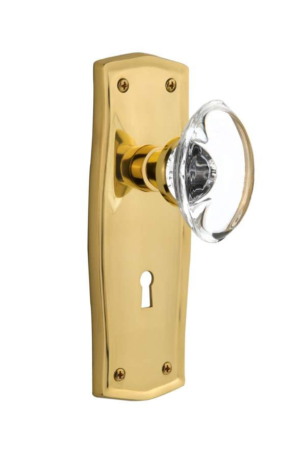 Nostalgic 711694: Prairie Backplate w/Oval Clear Glass Crystal Knob Privacy Door Set - Polished Brass