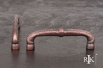 RKI CP-863-DC: 5" cc Bow Cabinet Pull w/Petals And Solid Line - Distressed Copper
