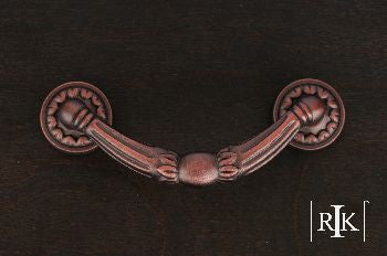 RKI CP-864-DC: 3" cc Ornate Drop Bail Cabinet Pull w/Petal Bases - Distressed Copper