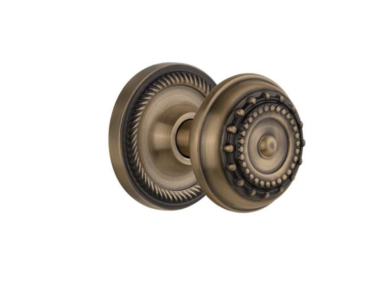 Nostalgic 702505: Rope Rosette w/Meadows Knob Passage Door Set - Antique Brass