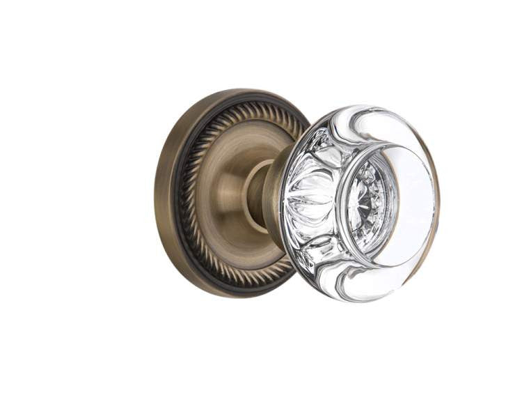 Nostalgic 712516: Rope Rosette w/Round Clear Glass Crystal Knob Privacy Door Set - Antique Brass