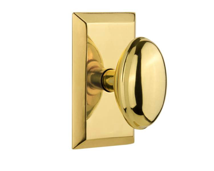 Nostalgic 713226: Studio Backplate w/Homestead Knob Passage Door Set - Polished Brass