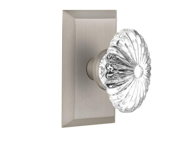 Nostalgic 713254: Studio Backplate w/Oval Fluted Clear Glass Crystal Knob Passage Door Set - Satin Nickel