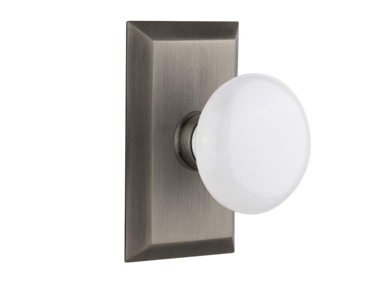 Nostalgic 713298: Studio Backplate w/White Porcelain Knob Passage Door Set - Antique Pewter