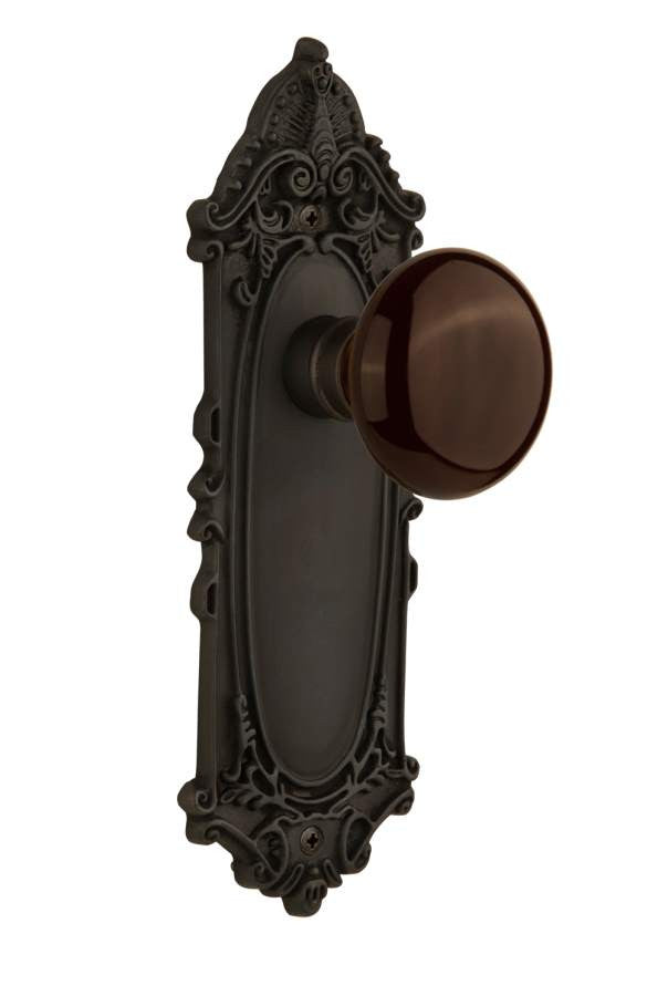 Nostalgic 710478: Victorian Backplate w/Brown Porcelain Knob Passage Door Set - Oil-Rubbed Bronze