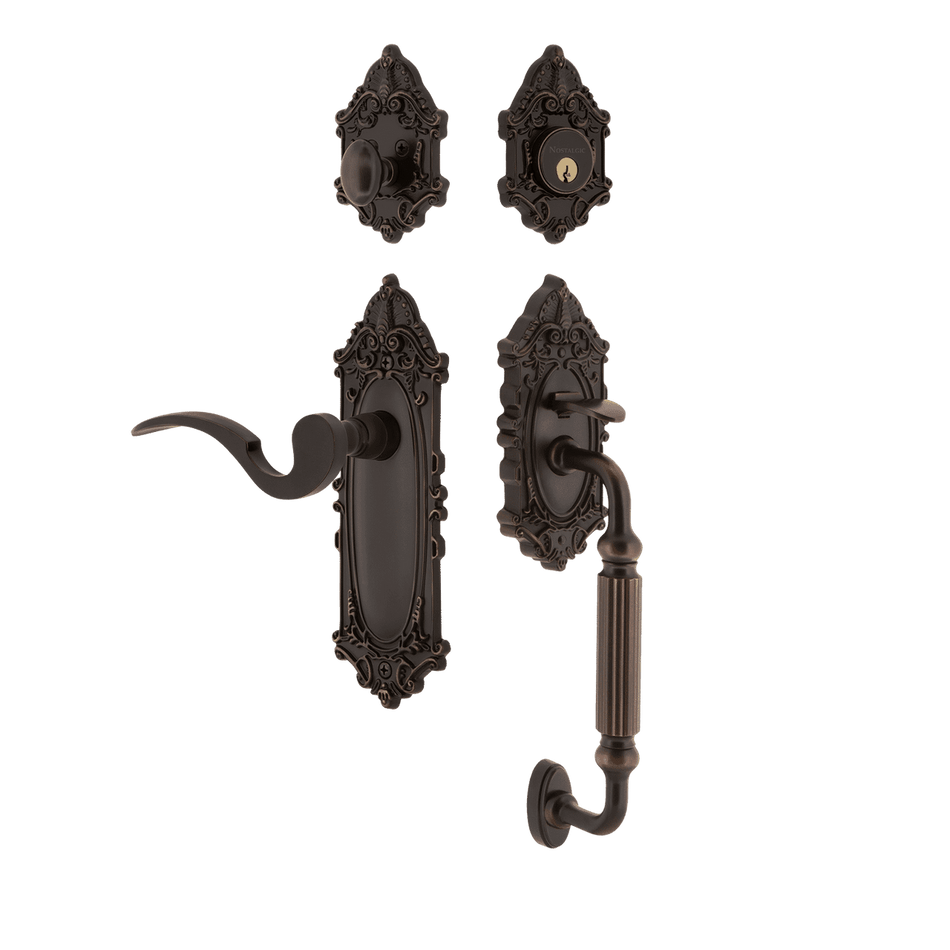 Nostalgic 767847: Entry Lockset w/Victorian Backplate, F-Grip Exterior Handle and Manor Interior Lever - Timeless Bronze