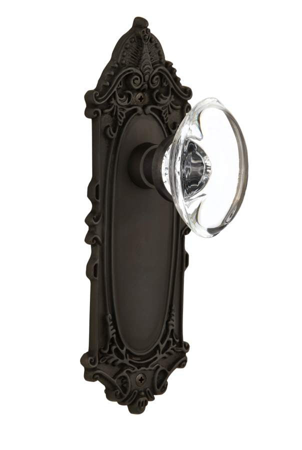 Nostalgic 711454: Victorian Backplate w/Oval Clear Glass Crystal Knob Single Dummy Door Set - Oil-Rubbed Bronze