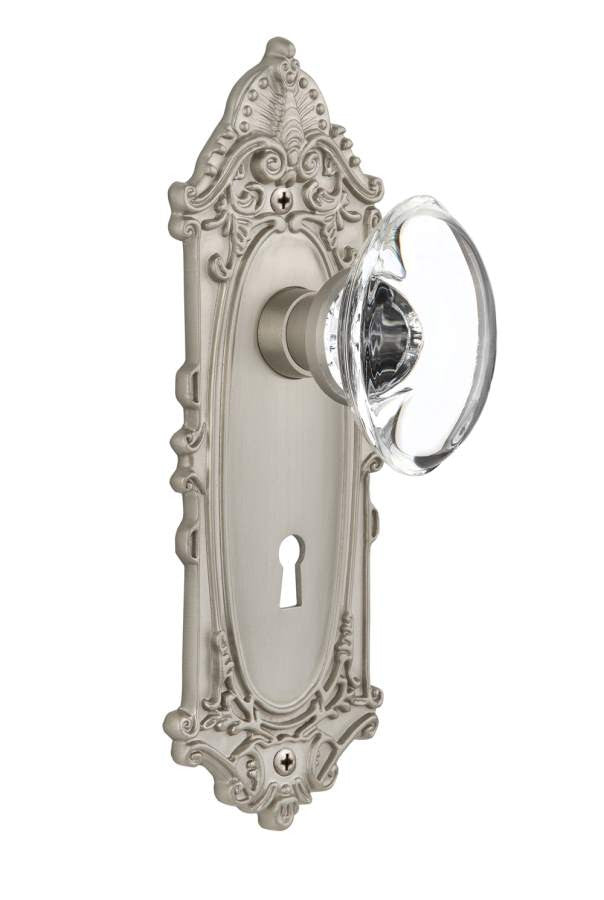 Nostalgic 711414: Victorian Backplate w/Oval Clear Glass Crystal Knob Passage Door Set - Satin Nickel