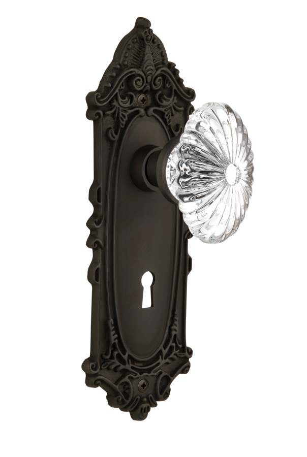 Nostalgic 711948: Victorian Backplate w/Oval Fluted Clear Glass Crystal Knob Single Dummy Door Set - Oil-Rubbed Bronze