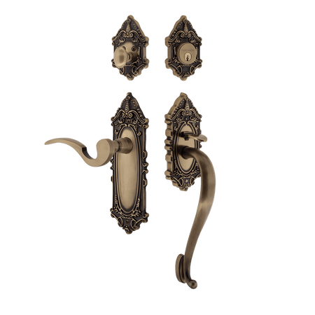 Nostalgic 767877: Entry Lockset w/Victorian Backplate, S-Grip Exterior Handle and Manor Interior Lever - Antique Brass