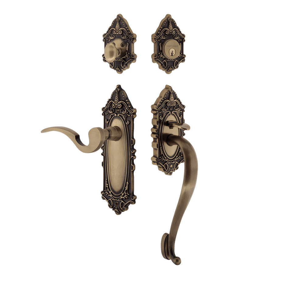 Nostalgic 767872: Entry Lockset w/Victorian Backplate, S-Grip Exterior Handle and Manor Interior Lever - Antique Brass