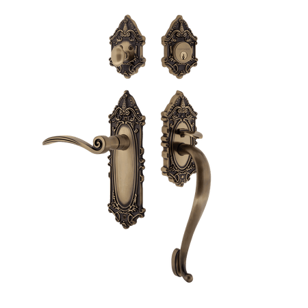 Nostalgic 771505: Entry Lockset w/Victorian Backplate, S-Grip Exterior Handle and Swan Interior Lever - Antique Brass