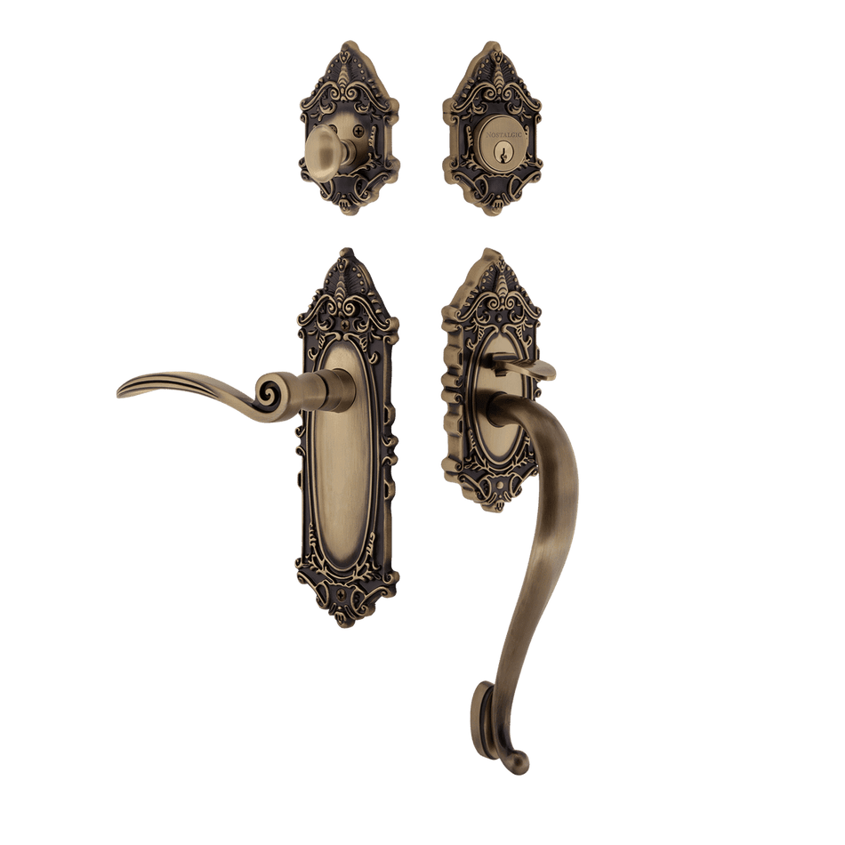 Nostalgic 768569: Entry Lockset w/Victorian Backplate, S-Grip Exterior Handle and Swan Interior Lever - Antique Brass