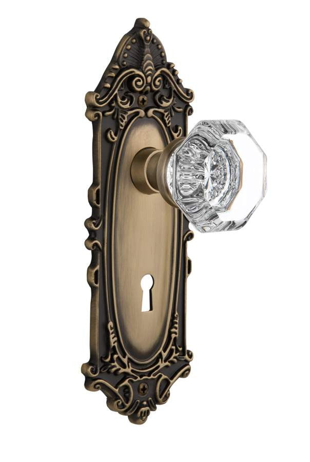 Nostalgic 704082: Victorian Backplate w/Waldorf Knob Passage Door Set - Antique Brass